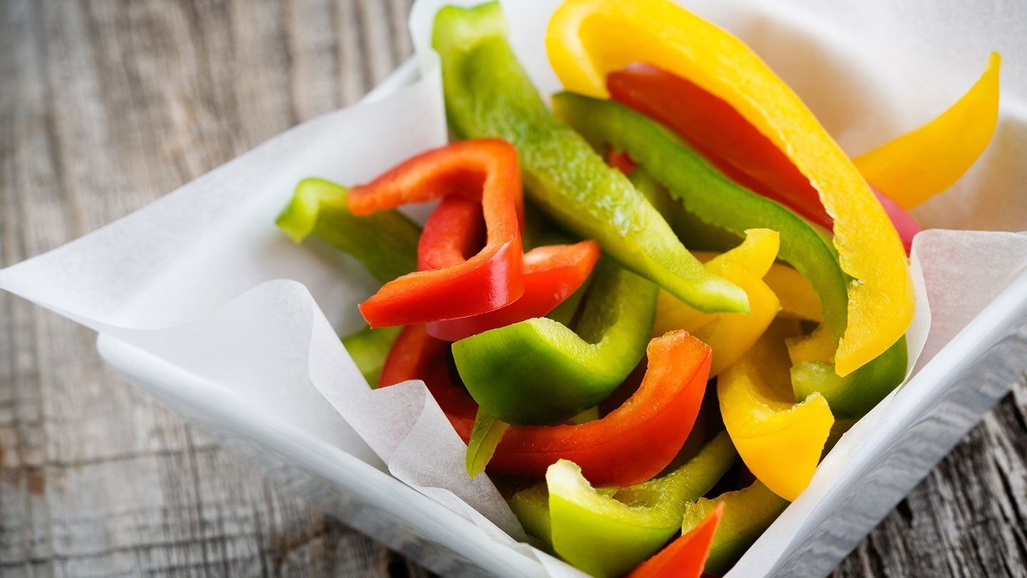 a plate of sliced peppers